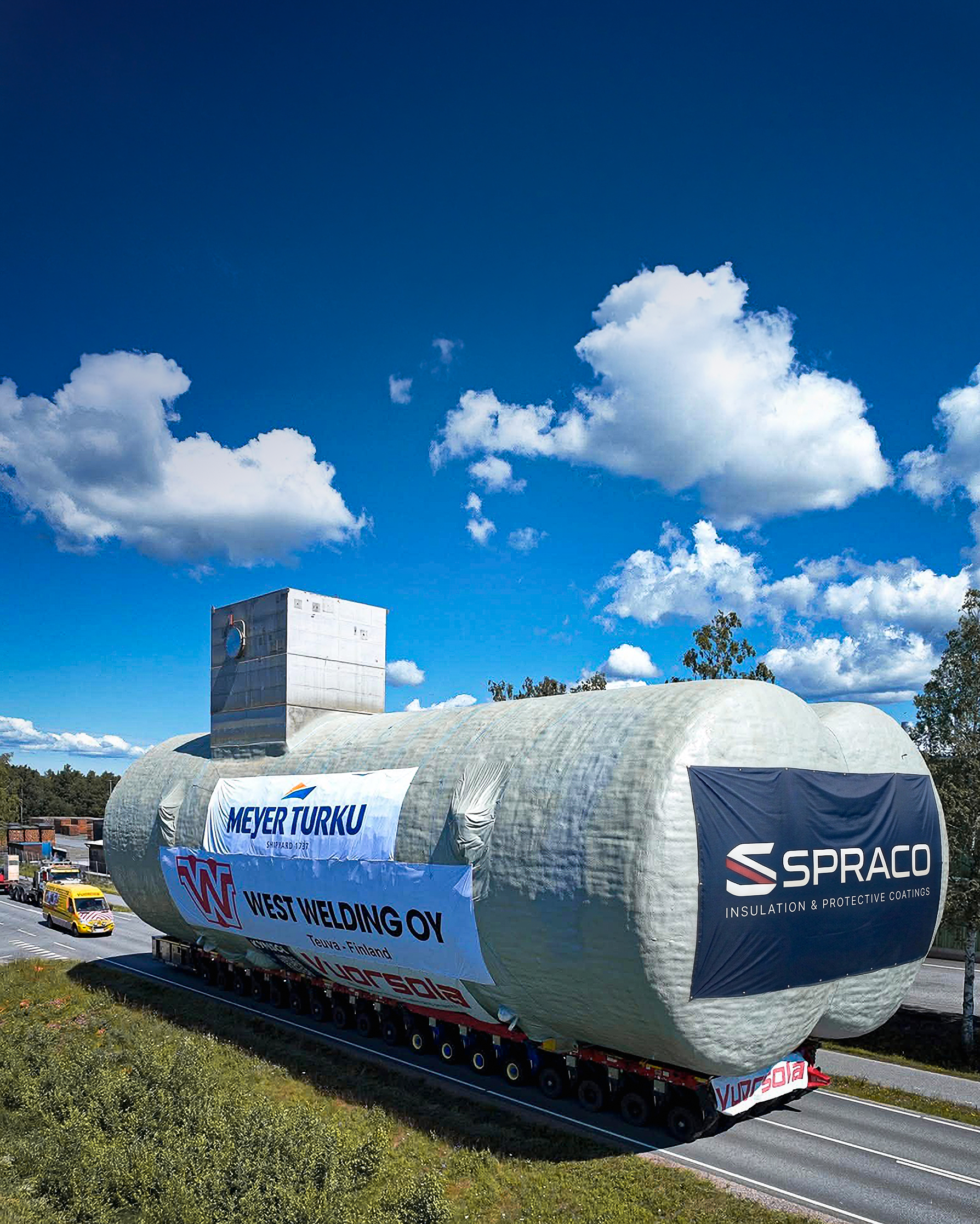 SPRACO insulated industrial tank on a transport trailer