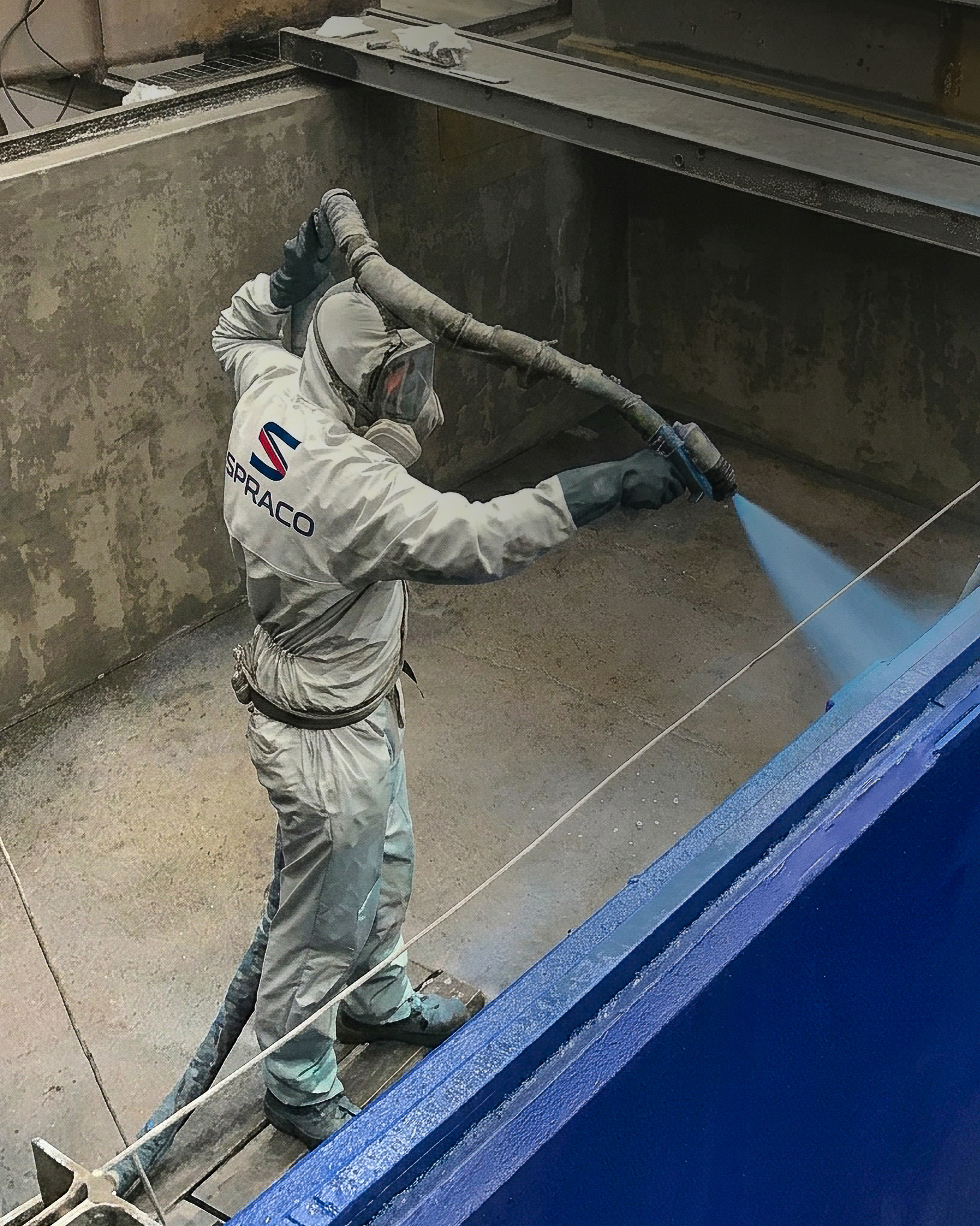 SPRACO technician applying a protective coating